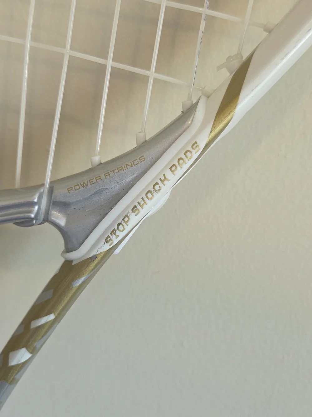 Wilson White Tennis Racket Wall Display with Red String Accent